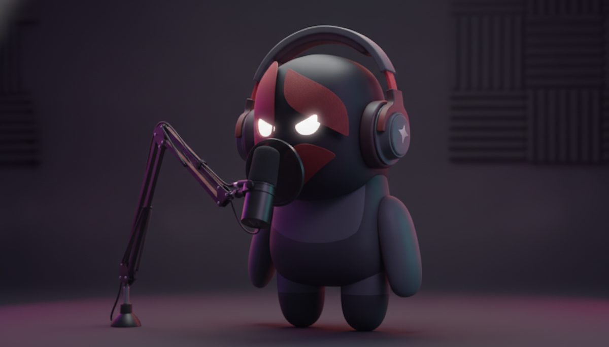 Beta, the Beta Ads mascot, behind a broadcast microphone