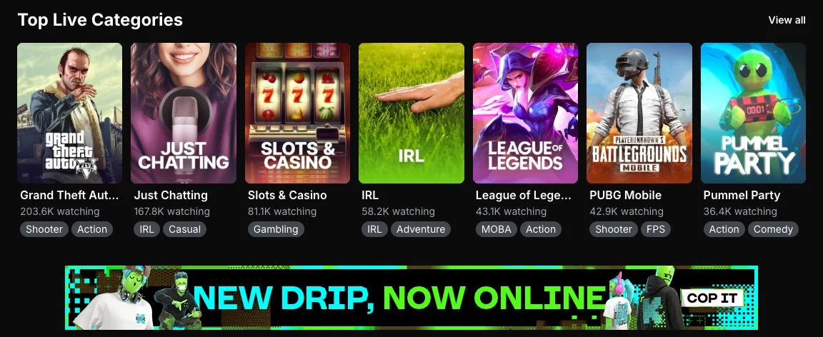 Kick's front page showing the Top Live Categories row: Grand Theft Auto V with 203.6K watching, Just Chatting 167.8K, Slots and Casino 81.1K, IRL 58.2K, League of Legends 43.1K, PUBG Mobile 42.9K, Pummel Party 36.4K, and a green homepage banner underneath